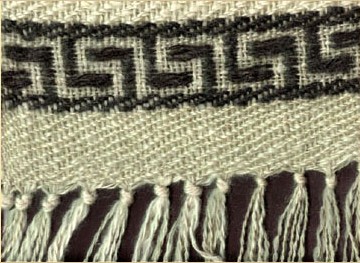 A rich natural colored mohair throw