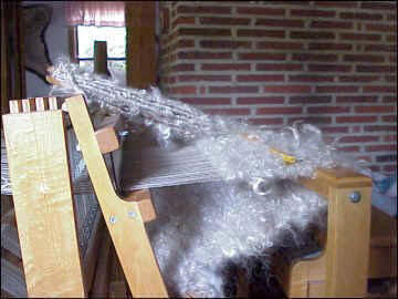 first in a series illustrating rug weaving